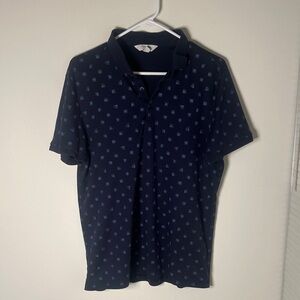 Calvin Klein Dark Blue Polo with Subtle Pattern